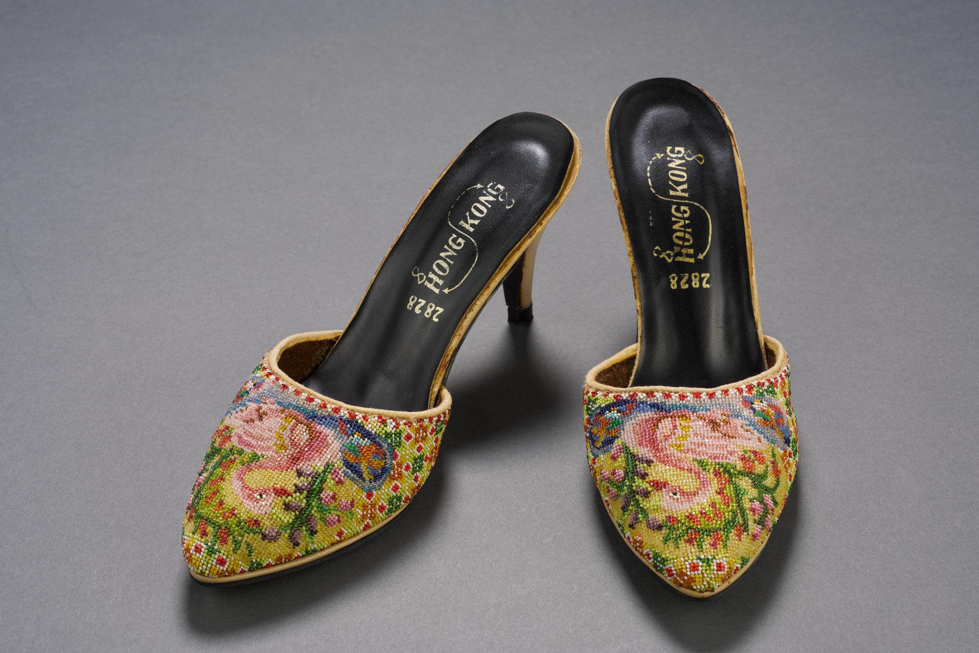 <strong>Peranakan shoes<br>
</strong><br>
1999-01353<br>
Early 20th century<br>
Singapore<br>
Collection of the Peranakan Museum<br>
<br>
<p style="color: #000000; margin: 0in 0in 8pt;"><span style="background: white; letter-spacing: 0.4pt;">To see other <em>kasut manek </em>in the NC, click </span><span style="background: white; letter-spacing: 0.4pt; color: #0070c0;">here</span><span style="background: white; letter-spacing: 0.4pt;">.</span>